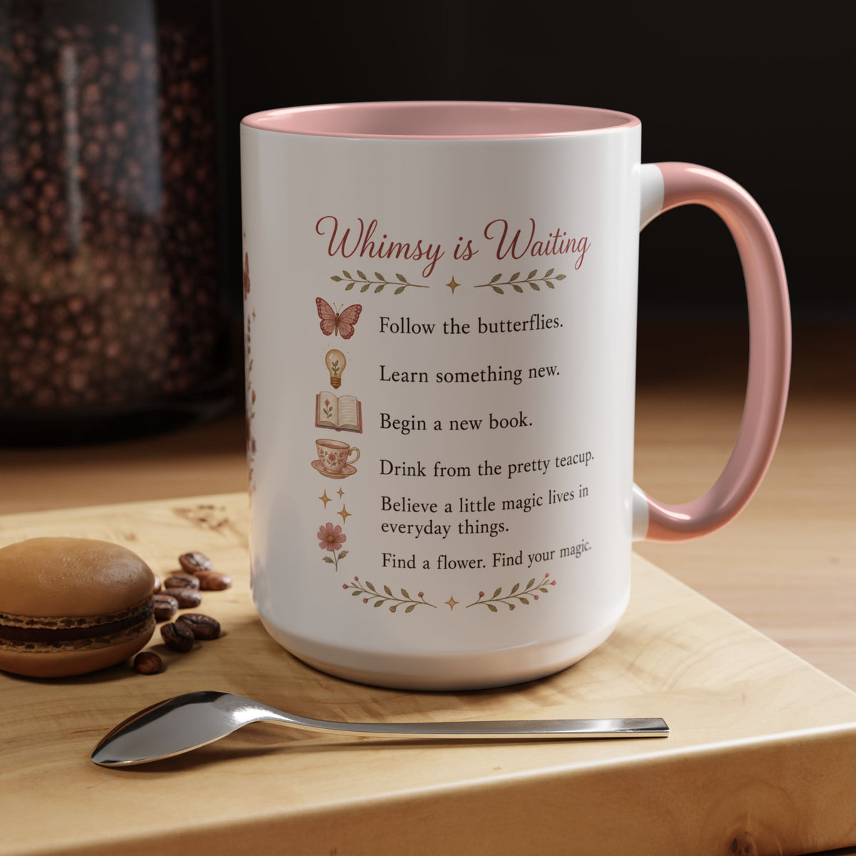 Close-up of the floral teacup and open book artwork on the mug